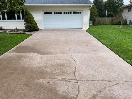 How does pressure washing help protect your driveway and walkways